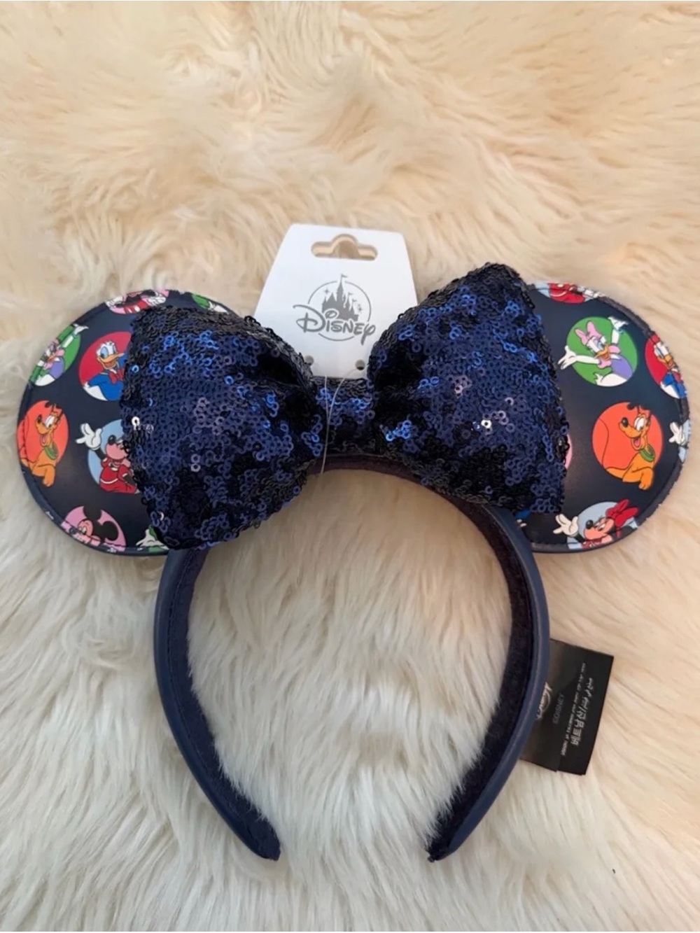 Disney Navy Sequin Bow Minnie Ear Headband with Character Print Ears